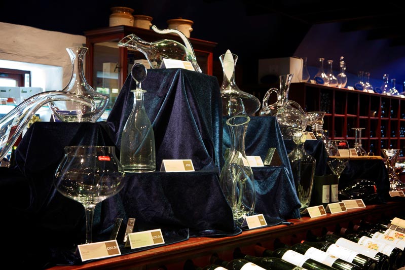 Display of decanters, wine glasses and accessories in Champany Cellars.